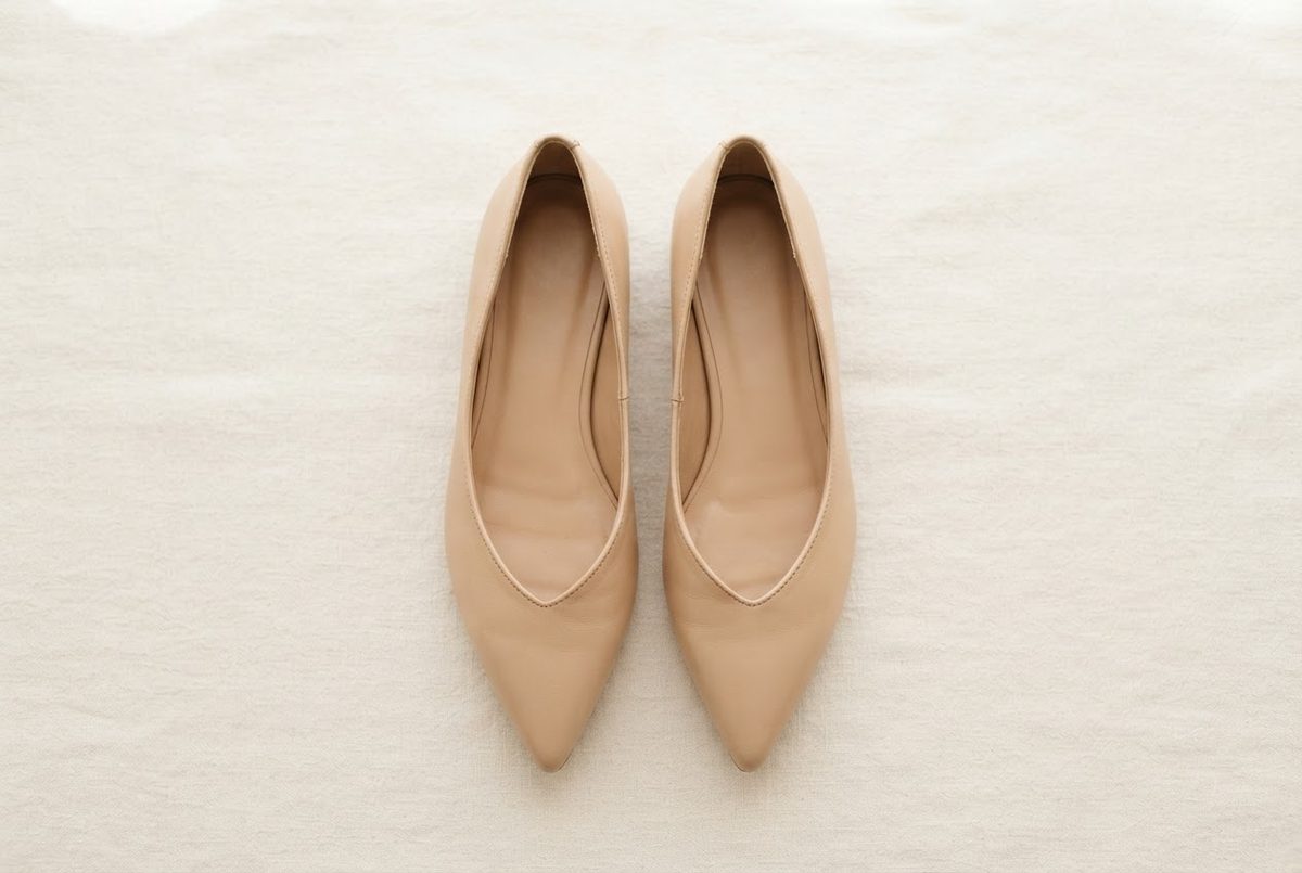 Pair of beige women's pointed flats
